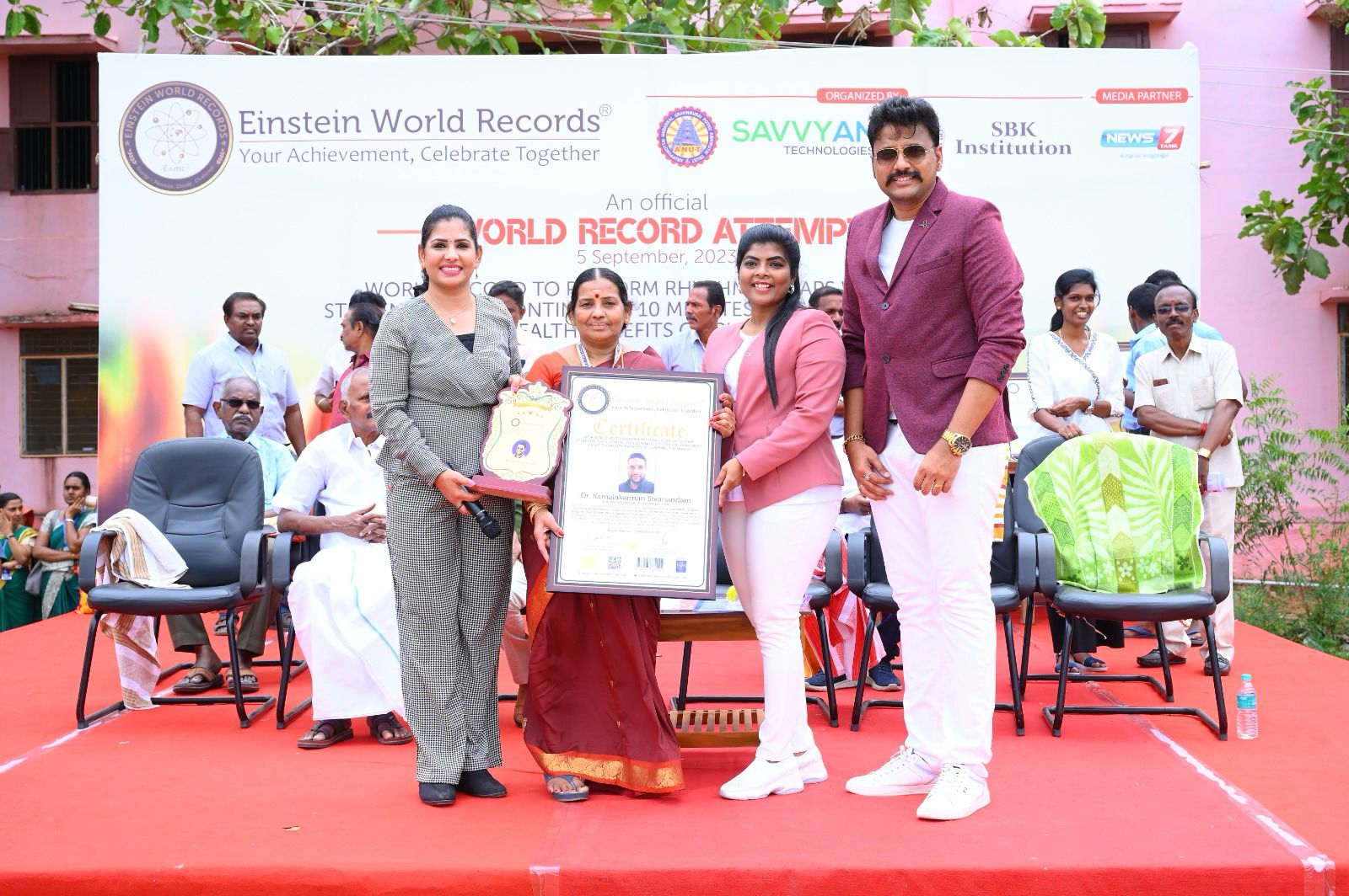 RHYTHMIC CLAPS WITH 5900 STUDENTS FOR A CONTINUOUS 10 MINUTES TO CREATE AWARENESS ABOUT THE HEALTH BENEFITS OF CLAPPING THE HANDS